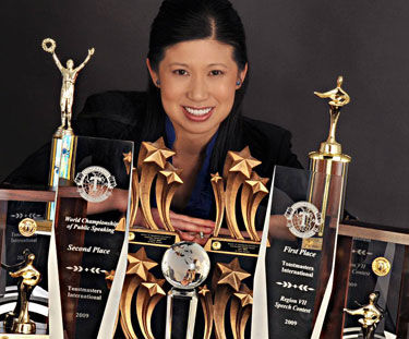 Mary Cheyne with her Toastmaster Contest Trophies